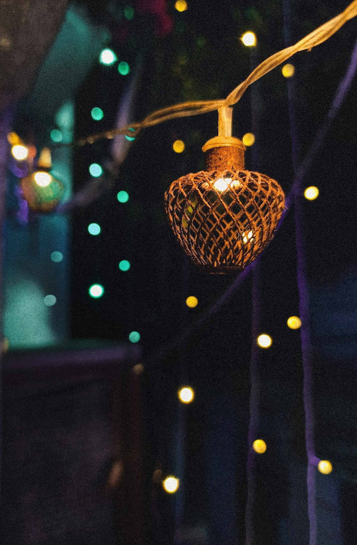 Festive lights and a glowing lantern at night during Diwali